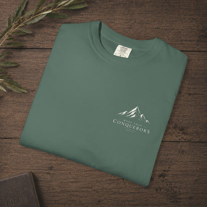 More than Conquerors — Romans 8:37 Subtle Scripture Tee | Chest Print