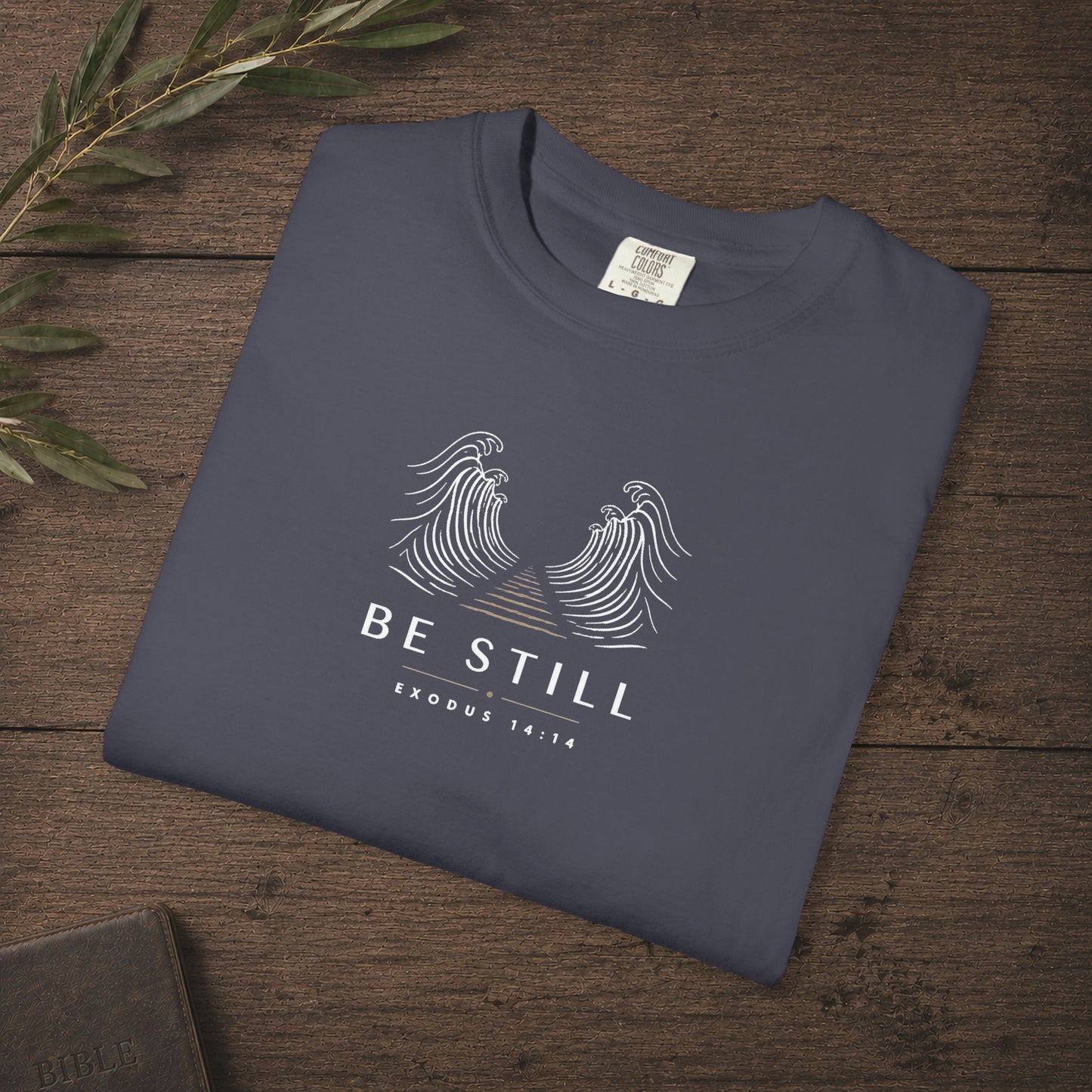 Be Still — Exodus 14:14 Subtle Scripture Tee | Chest Print