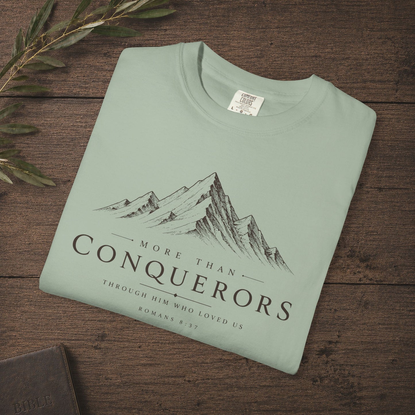 Illustrated Scripture Tee - Romans 8:37 - More than conquerors, Conquering Mountains Tee