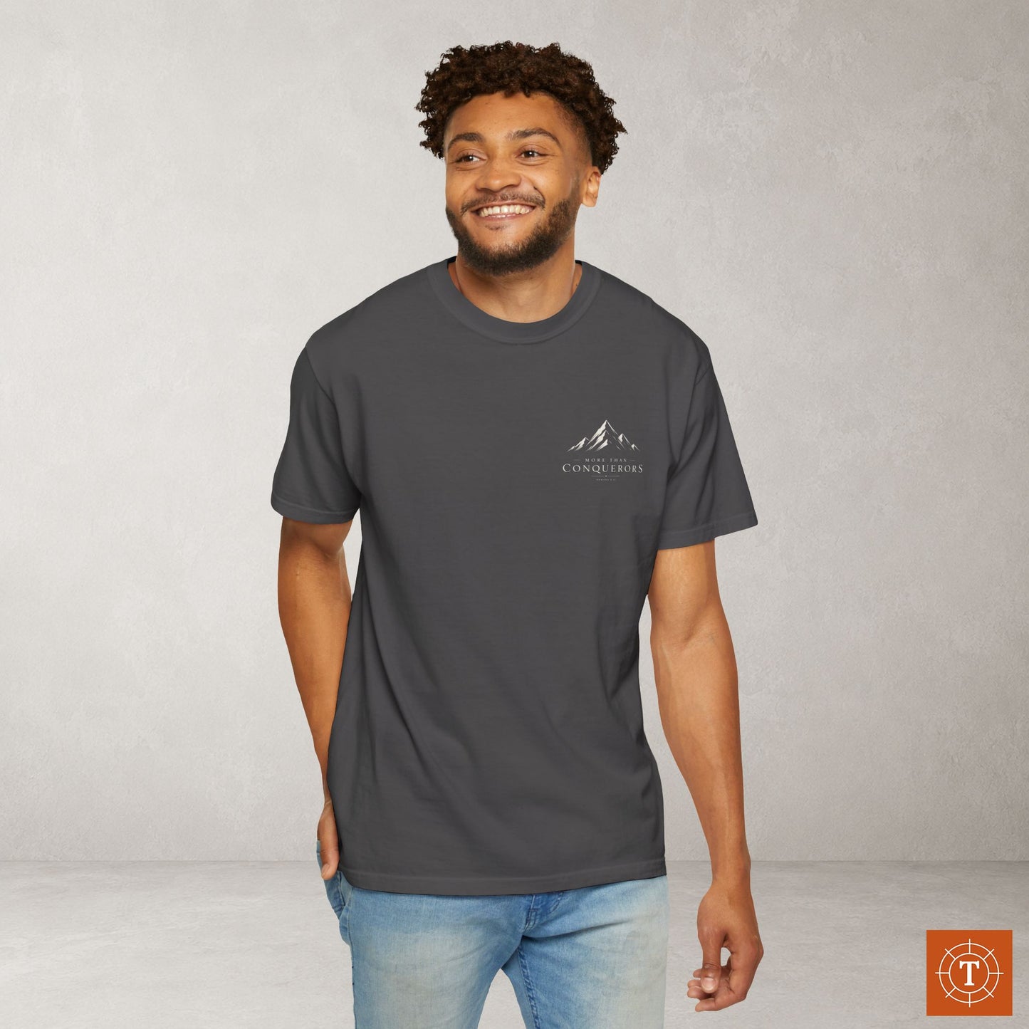 More than Conquerors — Romans 8:37 Subtle Scripture Tee | Chest Print