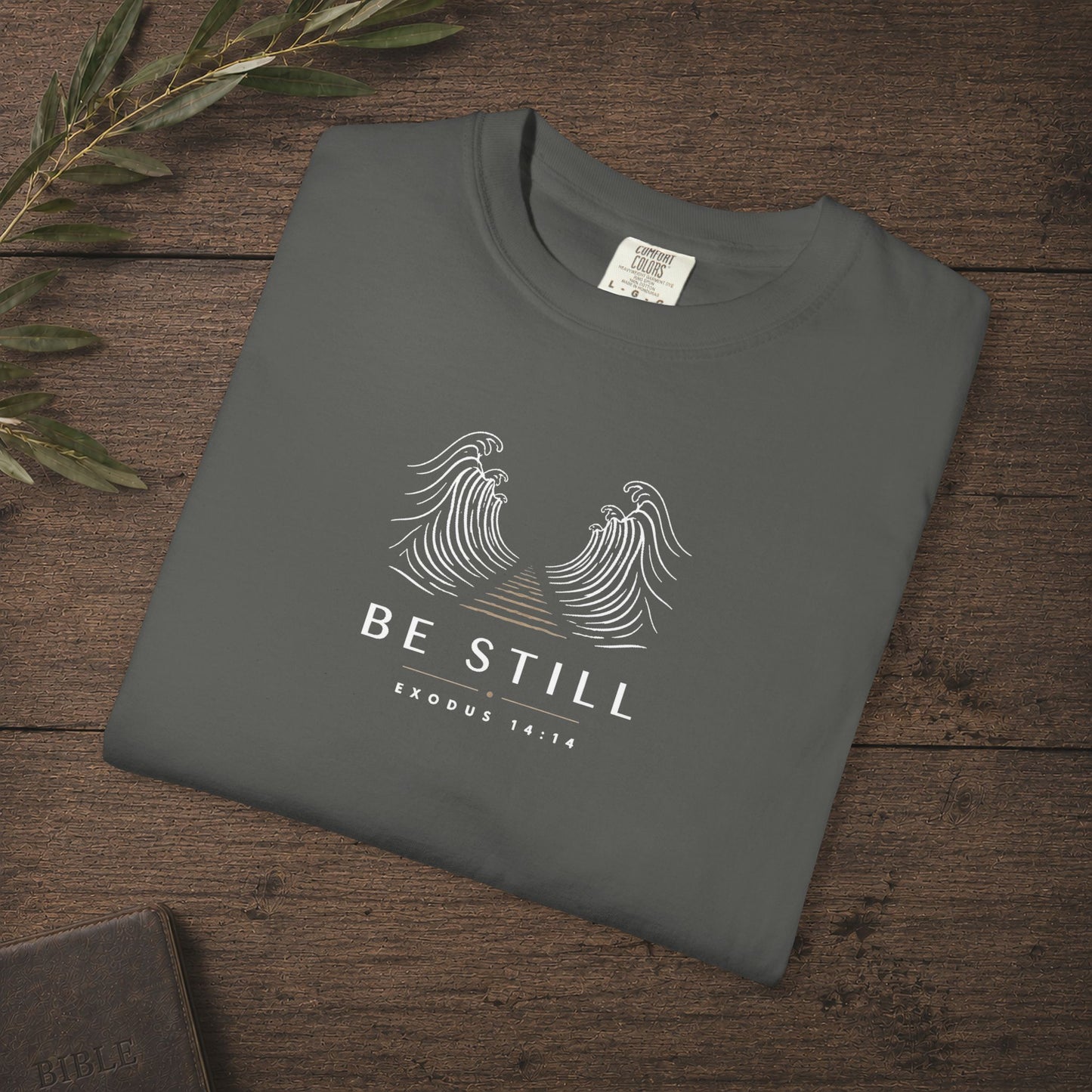 Be Still — Exodus 14:14 Subtle Scripture Tee | Chest Print